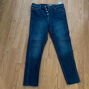 Raw hem button fly jeans